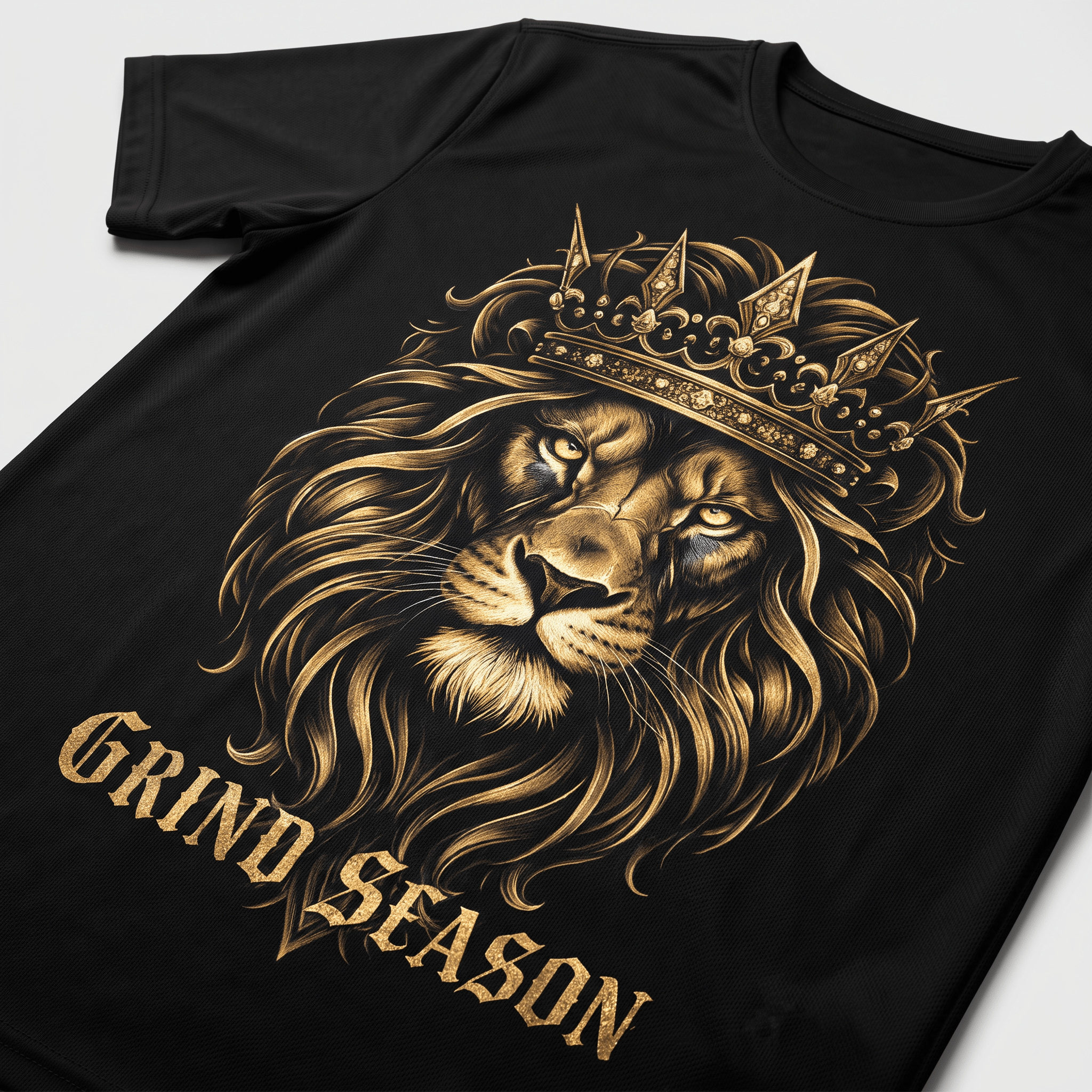 Black t-shirt featuring a gold graphic of a crowned lion and the words Grind Season.