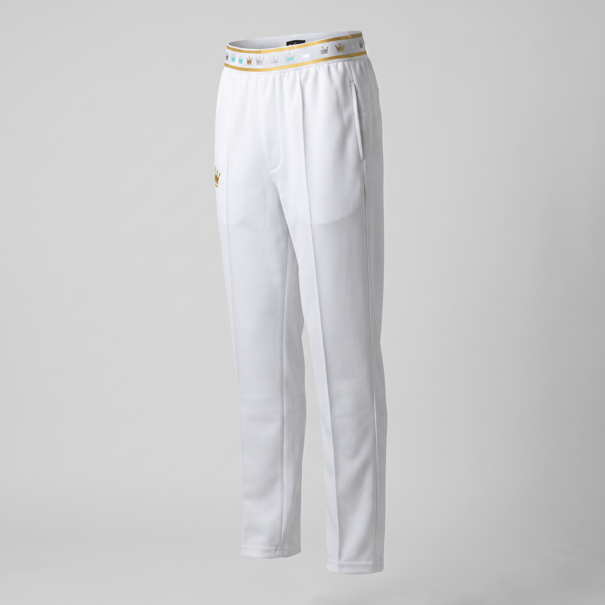 White athletic pants with a gold crown waistband and embroidered crown on the hip against a neutral background.