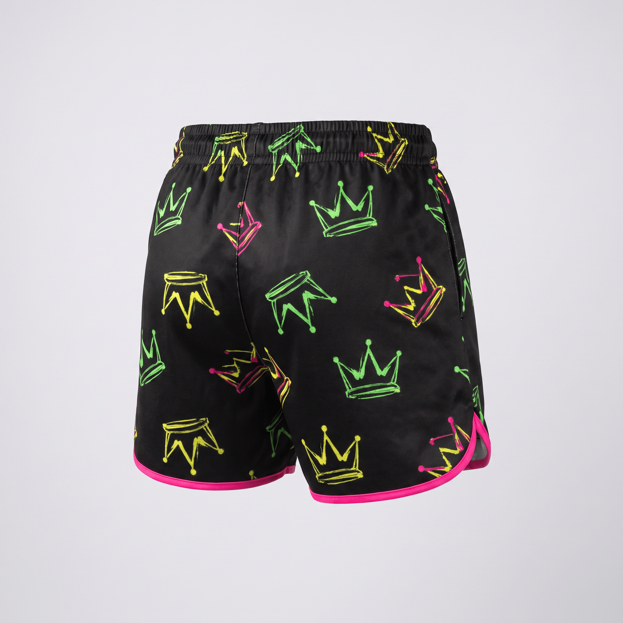 Black athletic shorts with neon green and pink crown print and pink trim, back view.