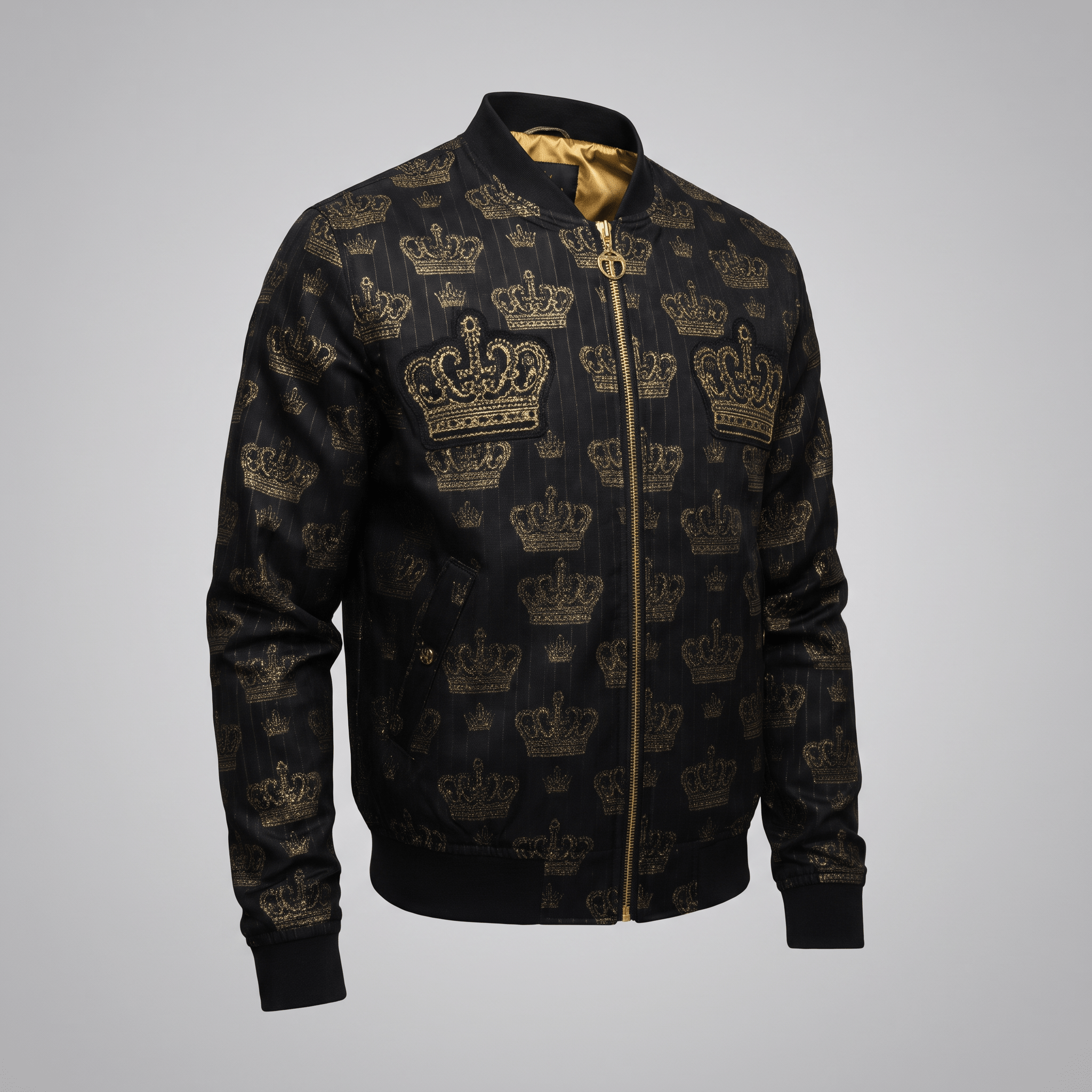 Black bomber jacket with gold crown pattern, gold zipper, and satin lining.