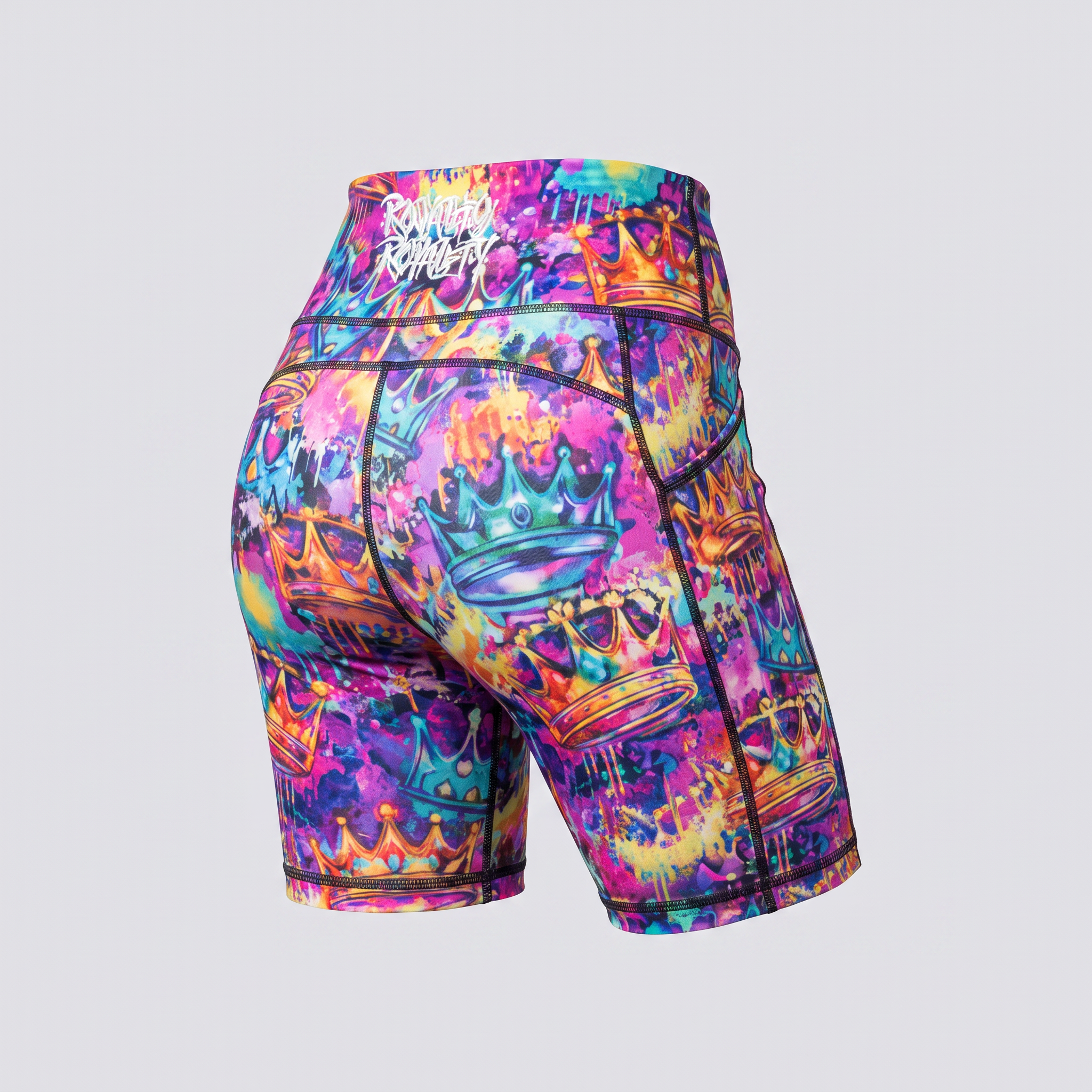 Rear view of colorful multi-colored crown graffiti athletic biker shorts featuring white logo on waistband.