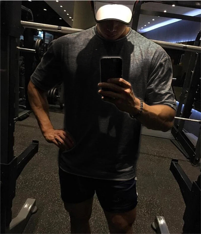 Oversized Gym Clothing Fitness Mens T Shirt Street Hip Hop Sportswear Loose Half Sleeve T-shirt Muscle Man Bodybuilding Tshirt