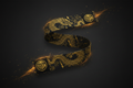 Black Titan boxing wrap with gold dragon print and circular logo patches, surrounded by glowing sparks.