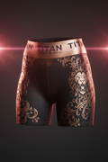 Black training shorts with metallic rose gold lion and floral print, featuring a branded TITAN sport waistband.
