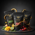 Three black TITAN Sport Global smoothie pouches surrounded by fresh tropical fruits, berries, and gold liquid swirls.