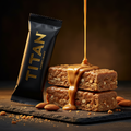 TITAN Keto Protein Bar Almond Butter Crunch — dynamic stacked bar shot with almond butter drizzle and whole roasted almonds