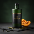 TITAN Pumpkin Seed Oil Cold-Pressed Crown Edition — premium dark green frosted glass bottle product shot