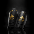 TITAN Soccer Shin Guards Crown Series — matte black with gold crown logo