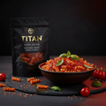 TITAN Clean Eating Protein Pasta Lentil Fusilli — rustic Italian plated dish with red lentil fusilli in tomato sauce, fresh basil and cherry tomatoes