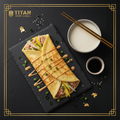 TITAN Taiwanese Tuna Dan Bing Egg Crepe Breakfast Wrap flat lay dark luxury