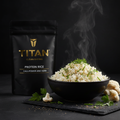 TITAN Clean Eating Protein Rice Cauliflower & Herb — steaming bowl shot with fluffy cauliflower rice, fresh herbs and olive oil drizzle