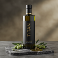 TITAN Extra Virgin Olive Oil Cold-Pressed Crown Edition — premium dark green glass bottle product shot