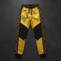 TITAN Women's Cyber Gold Crown Joggers flat lay