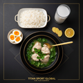 TITAN Malagasy Fish Romazava Breakfast flat lay dark luxury