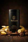 TITAN Paleo Protein Powder Banana Walnut — warm woodland canister shot with fresh bananas and cracked walnut halves on rustic wood surface
