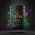 TITAN Greens Superfood Powder Original container with botanical leaves and crown tattoo-style Crown Edition artwork in emerald green, purple and gold