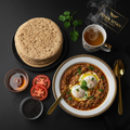 TITAN Yemeni Saltah Egg Power Breakfast flat lay dark luxury