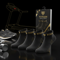 TITAN 6-pack low-cut black ankle socks with gold logo branding and textured detailing, displayed in packaging.