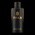 Matte black TITAN athlete body wash bottle with gold branding and water droplets against a black background.