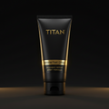 Black squeeze tube of TITAN Athlete Foot Cream with gold text and a gold band against a dark background.