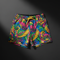 TITAN Crown Edition shorts with vibrant carnival-style print, yellow drawstring, and gold logo on dark grey background.