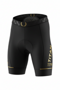 Black cycling shorts with gold Titan Sport Global branding, a laurel-patterned waistband, and reflective leg accents.