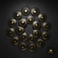 Twenty black flat disc cones with gold crown logos and intricate decorative patterns, arranged on a dark background.