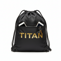 Black Titan drawstring sackpack with gold logo, front zippered pocket containing two phones and a keychain.