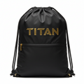 Black TITAN drawstring bag with gold logo, front zip pocket, gold hardware, and black rope straps.