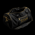 Black TITAN duffel bag with gold metallic logo, zippers, and hardware. Includes shoulder strap and side pockets.