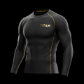 Black long-sleeve compression shirt with gold stitching and gold metallic TITAN logo on the chest.