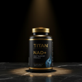 Black supplement bottle with gold cap and text, featuring a blue joint graphic, set on dark marble under a spotlight.