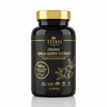 Black supplement bottle with gold cap and label, featuring Amla berry graphic, gold text, and 90 capsules count.