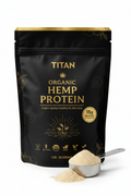 Black TITAN organic hemp protein bag with gold text, plant icons, 15g protein label, and a scoop of beige powder.