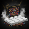 Ten white gym chalk blocks in front of a decorative black box with a lion, crown, and lightning bolt emblem.