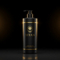 Matte black pump bottle with gold lion logo, "TITAN" text, and gold trim on a dark background with light dust particles.