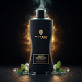 Matte black TITAN Arctic Mint shower gel bottle with gold logo, surrounded by fresh mint leaves and ice on dark base.