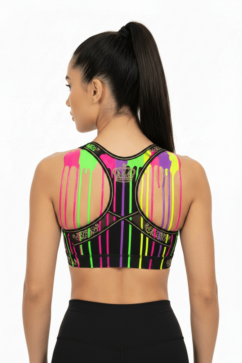 TITAN Sports Bra, Neon Drip Edition: Black racerback with neon paint drip print, gold crown logo, and mesh details.