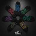 Six black crew socks arranged in a circle, each featuring a unique, detailed animal design in vibrant neon thread.