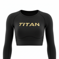 Black long-sleeve ribbed crop top with gold TITAN logo across the chest, featuring a scoop neckline.