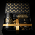 TITAN wellness set in a black box with gold crown patterns, featuring a foam roller, resistance bands, and gold ribbon.