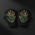 Black fingerless lifting gloves featuring a green coiled snake graphic, gold ornate detailing, and Titan branding.