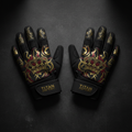 Black TITAN workout gloves with gold crown and tribal graphics, red accents, and adjustable branded wrist straps.